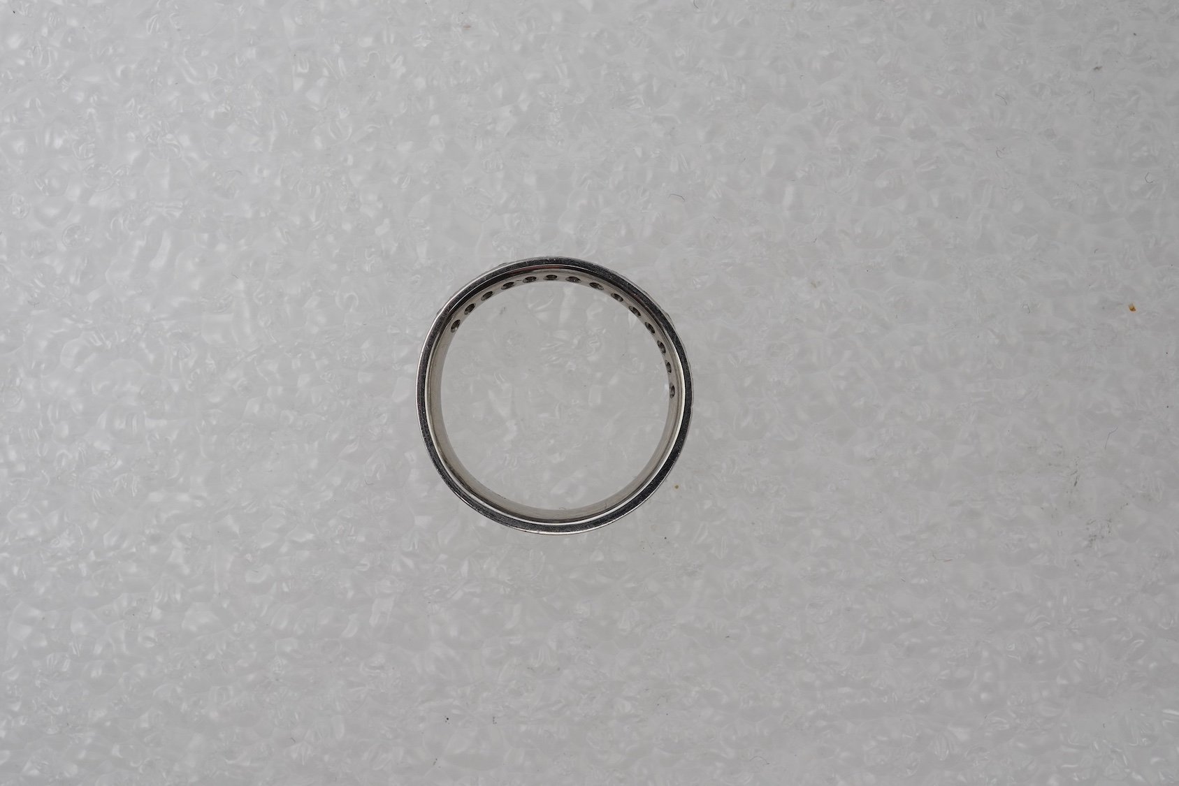 A diamond half eternity ring